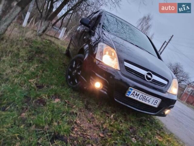 Черный Опель Мерива, объемом двигателя 1.6 л и пробегом 145 тыс. км за 3850 $, фото 7 на Automoto.ua