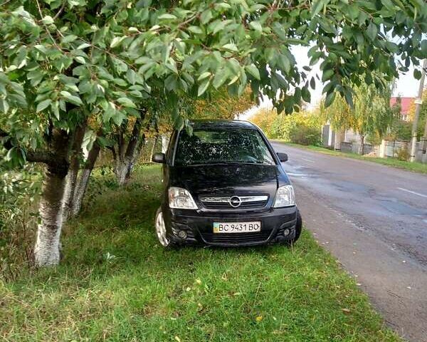 Черный Опель Мерива, объемом двигателя 1.6 л и пробегом 145 тыс. км за 2350 $, фото 13 на Automoto.ua