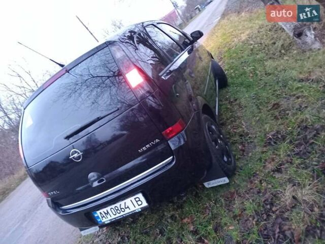 Черный Опель Мерива, объемом двигателя 1.6 л и пробегом 145 тыс. км за 3850 $, фото 5 на Automoto.ua