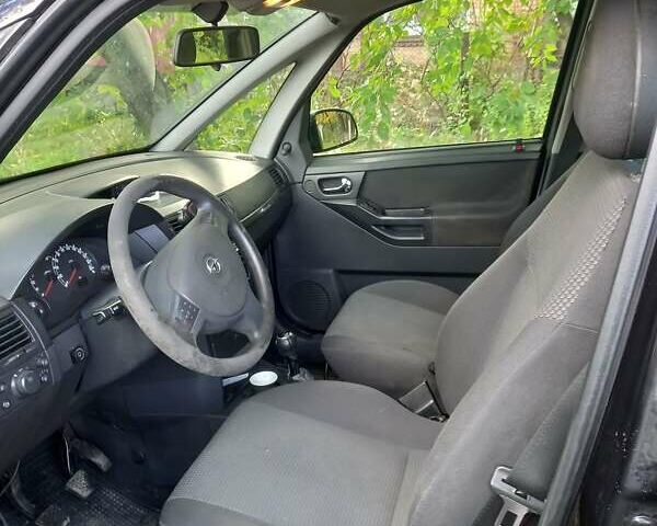 Черный Опель Мерива, объемом двигателя 1.6 л и пробегом 145 тыс. км за 2350 $, фото 5 на Automoto.ua