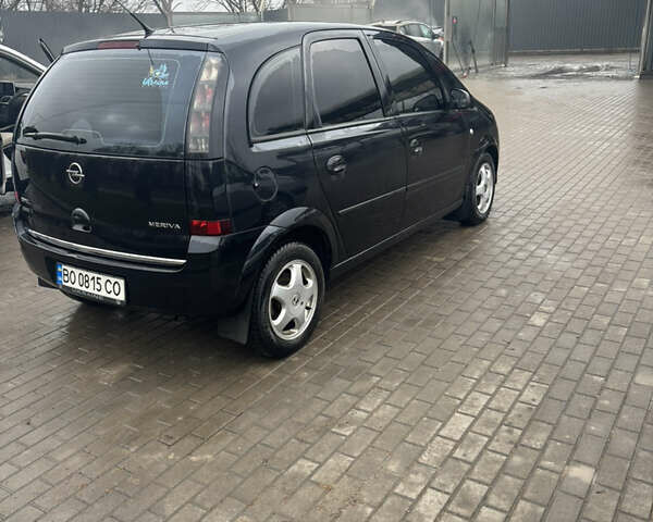 Черный Опель Мерива, объемом двигателя 1.6 л и пробегом 158 тыс. км за 4500 $, фото 4 на Automoto.ua
