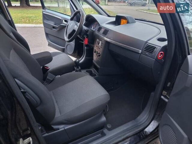 Черный Опель Мерива, объемом двигателя 1.6 л и пробегом 177 тыс. км за 4899 $, фото 27 на Automoto.ua