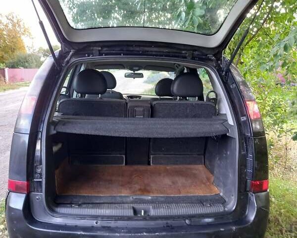 Черный Опель Мерива, объемом двигателя 1.6 л и пробегом 145 тыс. км за 2350 $, фото 10 на Automoto.ua