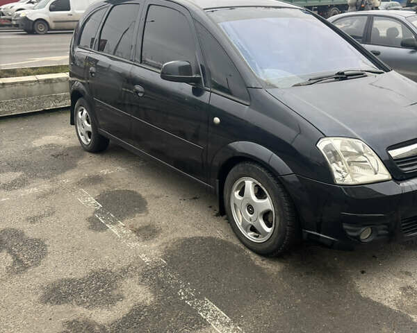 Черный Опель Мерива, объемом двигателя 1.6 л и пробегом 158 тыс. км за 4500 $, фото 9 на Automoto.ua