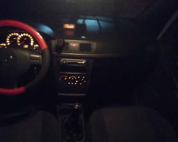 Черный Опель Мерива, объемом двигателя 1.6 л и пробегом 145 тыс. км за 3850 $, фото 16 на Automoto.ua