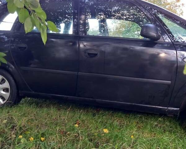 Черный Опель Мерива, объемом двигателя 1.6 л и пробегом 145 тыс. км за 2350 $, фото 12 на Automoto.ua