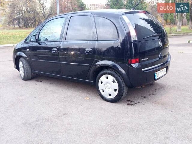 Черный Опель Мерива, объемом двигателя 1.6 л и пробегом 177 тыс. км за 4899 $, фото 2 на Automoto.ua