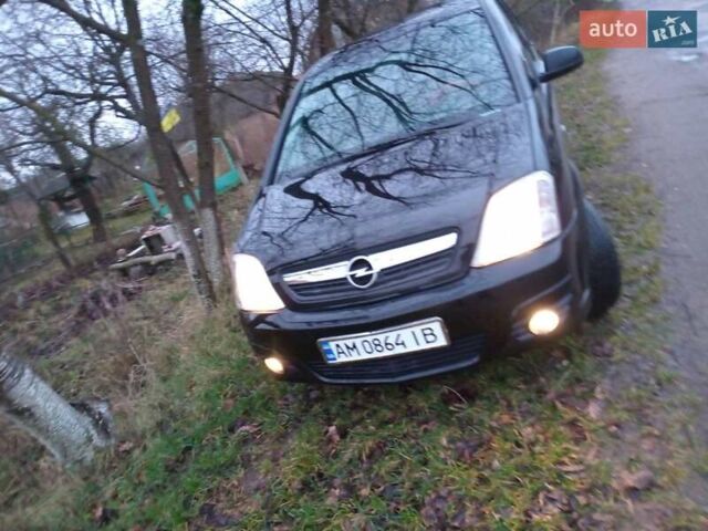 Черный Опель Мерива, объемом двигателя 1.6 л и пробегом 145 тыс. км за 3850 $, фото 1 на Automoto.ua