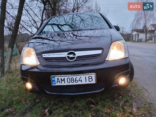 Черный Опель Мерива, объемом двигателя 1.6 л и пробегом 145 тыс. км за 3850 $, фото 3 на Automoto.ua