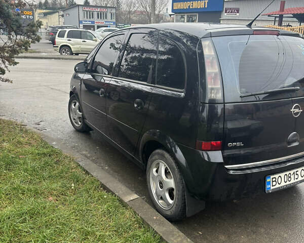 Черный Опель Мерива, объемом двигателя 1.6 л и пробегом 158 тыс. км за 4500 $, фото 14 на Automoto.ua