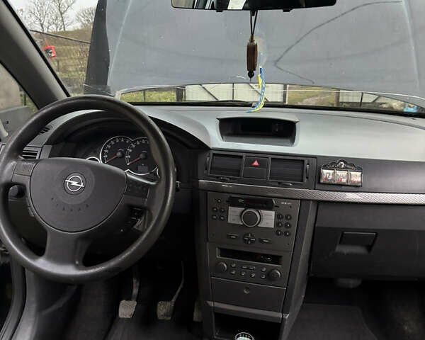 Черный Опель Мерива, объемом двигателя 1.6 л и пробегом 158 тыс. км за 4500 $, фото 20 на Automoto.ua