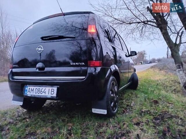 Черный Опель Мерива, объемом двигателя 1.6 л и пробегом 145 тыс. км за 3850 $, фото 13 на Automoto.ua