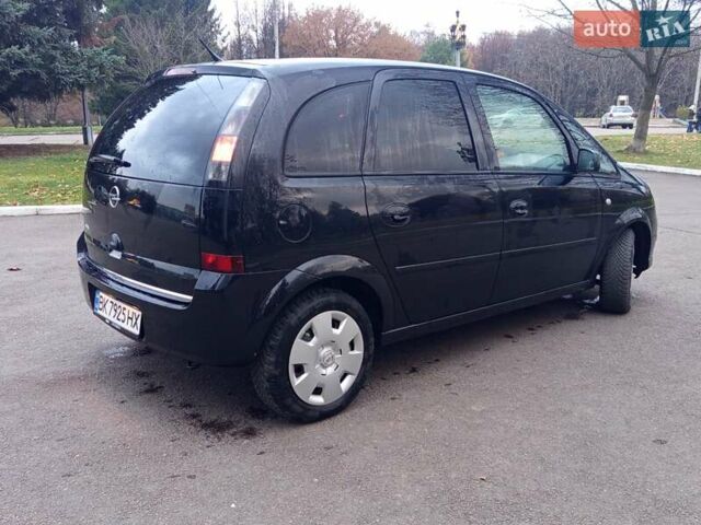 Черный Опель Мерива, объемом двигателя 1.6 л и пробегом 177 тыс. км за 4899 $, фото 7 на Automoto.ua