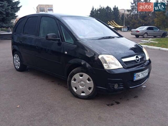 Черный Опель Мерива, объемом двигателя 1.6 л и пробегом 177 тыс. км за 4899 $, фото 6 на Automoto.ua