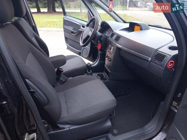 Черный Опель Мерива, объемом двигателя 1.6 л и пробегом 177 тыс. км за 4899 $, фото 25 на Automoto.ua