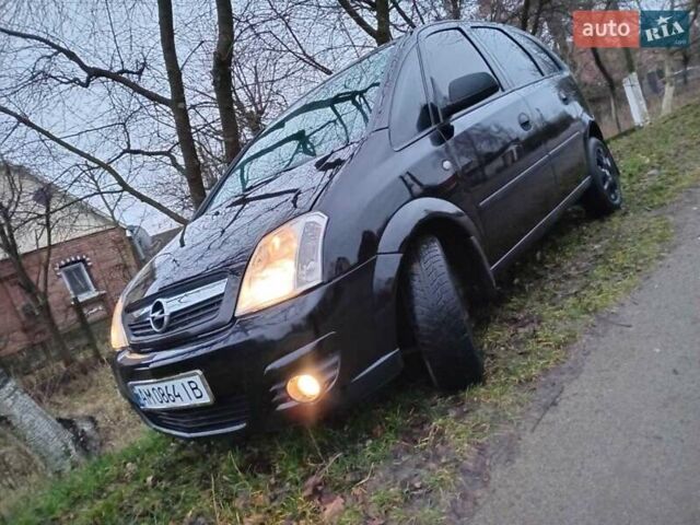 Черный Опель Мерива, объемом двигателя 1.6 л и пробегом 145 тыс. км за 3850 $, фото 4 на Automoto.ua