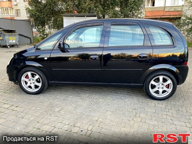 Чорний Опель Меріва, об'ємом двигуна 1.8 л та пробігом 260 тис. км за 5800 $, фото 2 на Automoto.ua