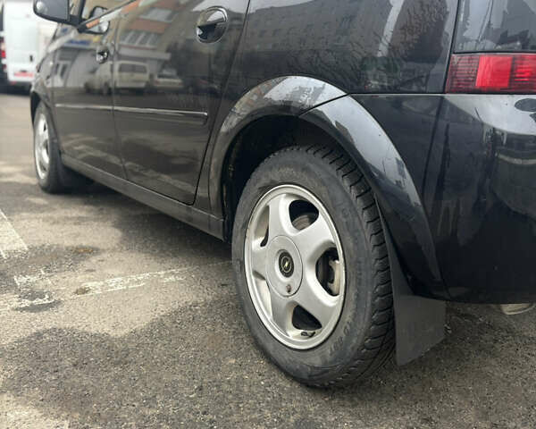 Черный Опель Мерива, объемом двигателя 1.6 л и пробегом 158 тыс. км за 4500 $, фото 10 на Automoto.ua