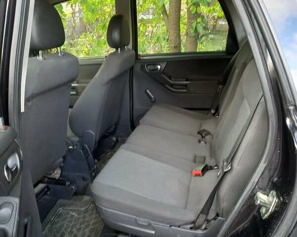 Черный Опель Мерива, объемом двигателя 1.6 л и пробегом 145 тыс. км за 2350 $, фото 9 на Automoto.ua