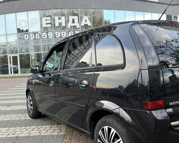 Черный Опель Мерива, объемом двигателя 1.6 л и пробегом 255 тыс. км за 4199 $, фото 9 на Automoto.ua