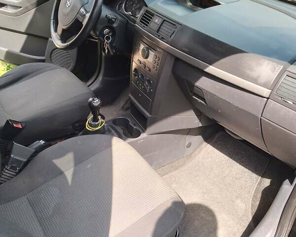 Черный Опель Мерива, объемом двигателя 1.36 л и пробегом 160 тыс. км за 3800 $, фото 10 на Automoto.ua