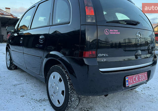 Черный Опель Мерива, объемом двигателя 1.6 л и пробегом 150 тыс. км за 5750 $, фото 5 на Automoto.ua