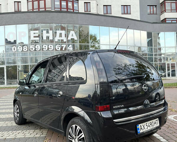 Черный Опель Мерива, объемом двигателя 1.6 л и пробегом 255 тыс. км за 4199 $, фото 8 на Automoto.ua