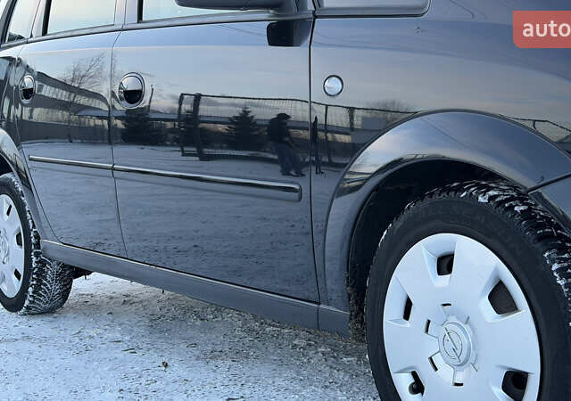 Черный Опель Мерива, объемом двигателя 1.6 л и пробегом 150 тыс. км за 5750 $, фото 13 на Automoto.ua