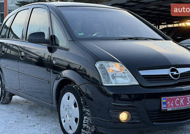 Черный Опель Мерива, объемом двигателя 1.6 л и пробегом 150 тыс. км за 5750 $, фото 11 на Automoto.ua