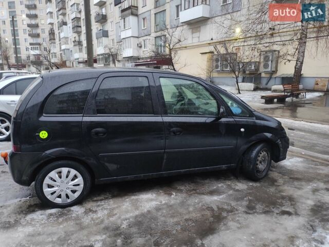 Черный Опель Мерива, объемом двигателя 1.4 л и пробегом 205 тыс. км за 5500 $, фото 10 на Automoto.ua