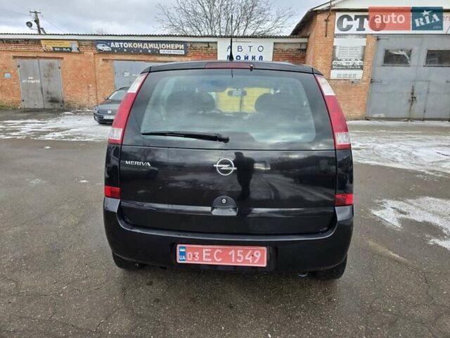 Черный Опель Мерива, объемом двигателя 1.6 л и пробегом 230 тыс. км за 3999 $, фото 4 на Automoto.ua