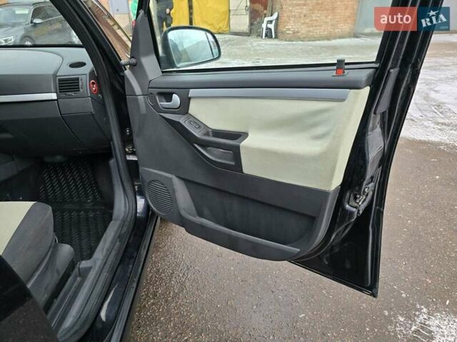 Черный Опель Мерива, объемом двигателя 1.6 л и пробегом 230 тыс. км за 3999 $, фото 11 на Automoto.ua