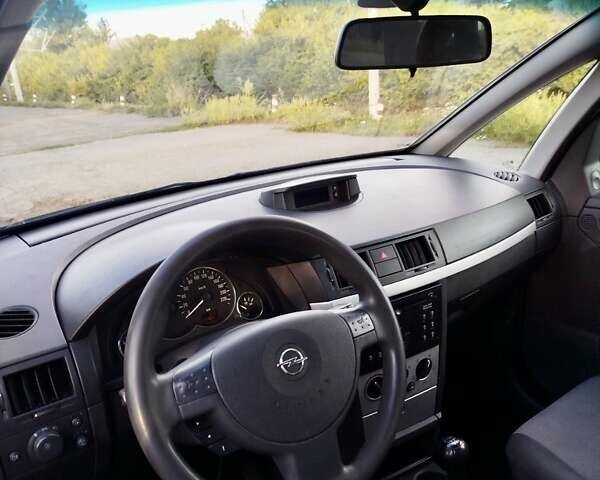 Черный Опель Мерива, объемом двигателя 1.6 л и пробегом 204 тыс. км за 4365 $, фото 13 на Automoto.ua