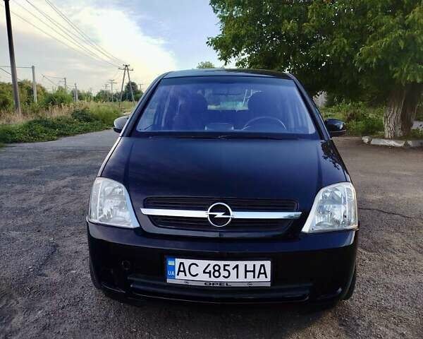 Черный Опель Мерива, объемом двигателя 1.6 л и пробегом 204 тыс. км за 4365 $, фото 6 на Automoto.ua