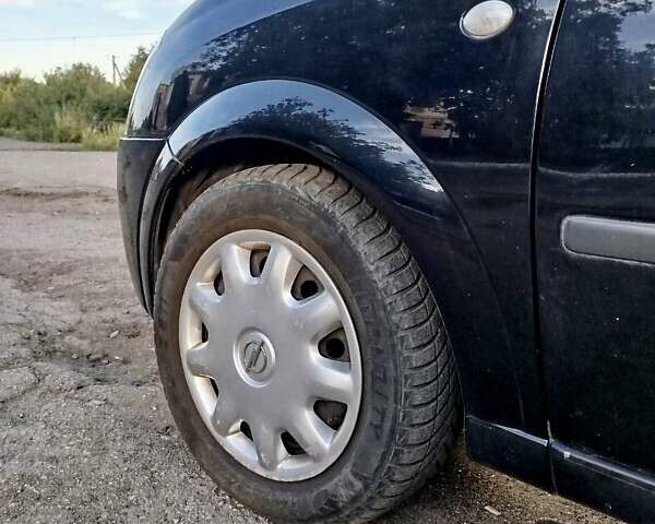 Черный Опель Мерива, объемом двигателя 1.6 л и пробегом 204 тыс. км за 4365 $, фото 29 на Automoto.ua