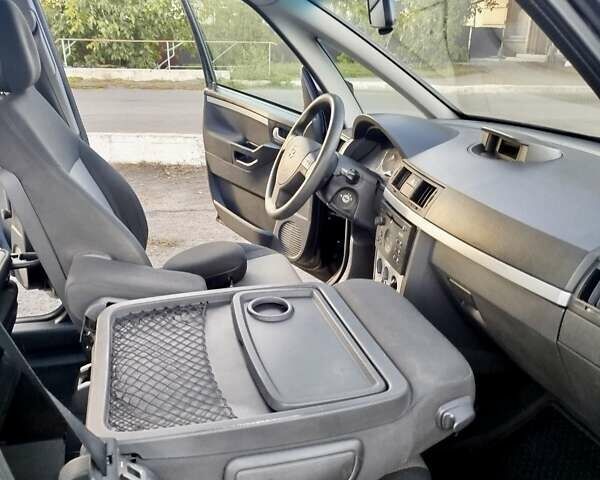 Черный Опель Мерива, объемом двигателя 1.6 л и пробегом 204 тыс. км за 4365 $, фото 27 на Automoto.ua