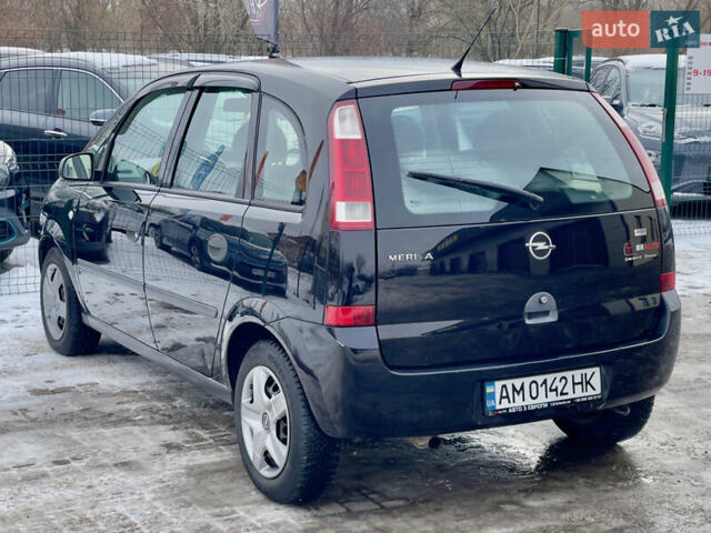 Черный Опель Мерива, объемом двигателя 1.6 л и пробегом 153 тыс. км за 4555 $, фото 21 на Automoto.ua