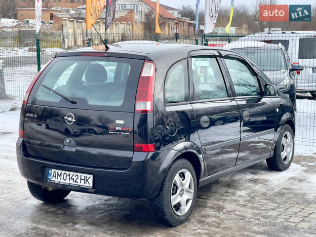 Черный Опель Мерива, объемом двигателя 1.6 л и пробегом 153 тыс. км за 4555 $, фото 17 на Automoto.ua