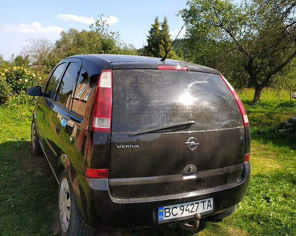 Черный Опель Мерива, объемом двигателя 1.6 л и пробегом 370 тыс. км за 3000 $, фото 1 на Automoto.ua