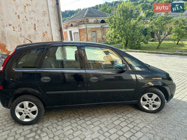 Чорний Опель Меріва, об'ємом двигуна 1.69 л та пробігом 274 тис. км за 3700 $, фото 5 на Automoto.ua