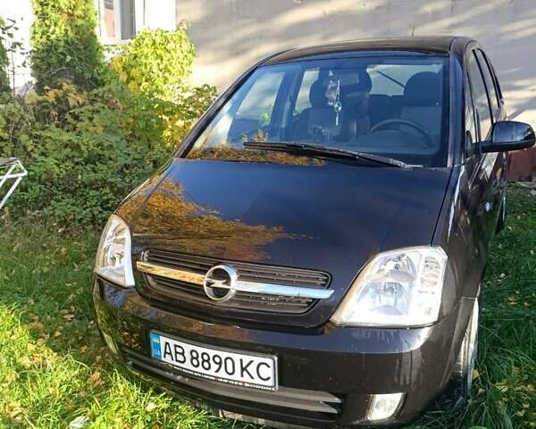 Черный Опель Мерива, объемом двигателя 1.6 л и пробегом 208 тыс. км за 3900 $, фото 5 на Automoto.ua
