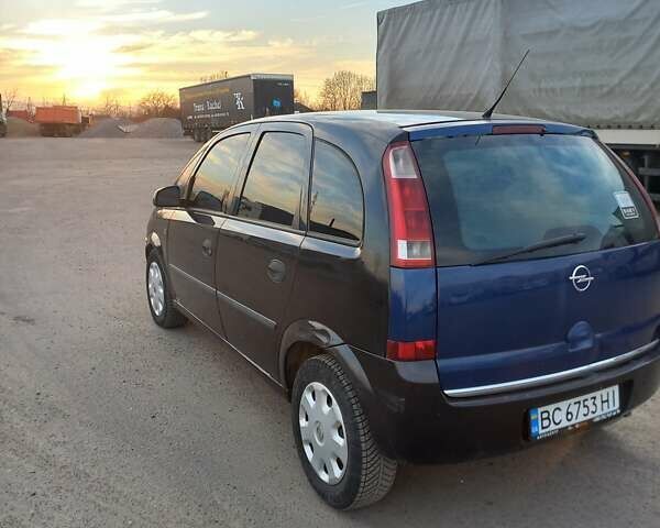 Черный Опель Мерива, объемом двигателя 1.69 л и пробегом 270 тыс. км за 2600 $, фото 3 на Automoto.ua