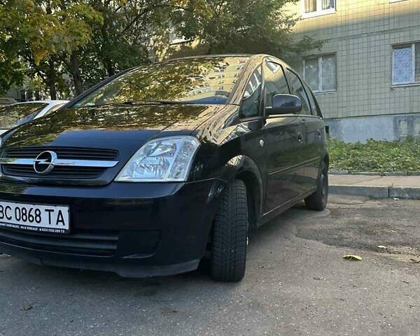Черный Опель Мерива, объемом двигателя 1.6 л и пробегом 228 тыс. км за 4500 $, фото 2 на Automoto.ua