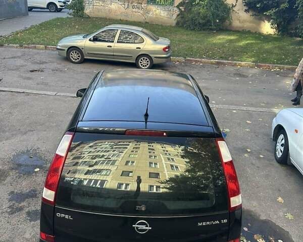 Черный Опель Мерива, объемом двигателя 1.6 л и пробегом 228 тыс. км за 4500 $, фото 5 на Automoto.ua