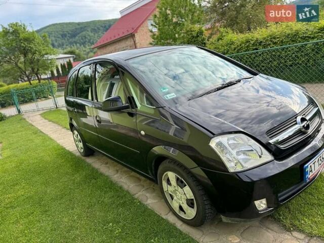 Черный Опель Мерива, объемом двигателя 1.6 л и пробегом 138 тыс. км за 3700 $, фото 7 на Automoto.ua