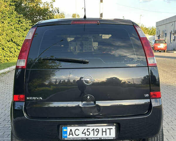 Черный Опель Мерива, объемом двигателя 1.6 л и пробегом 225 тыс. км за 4600 $, фото 7 на Automoto.ua