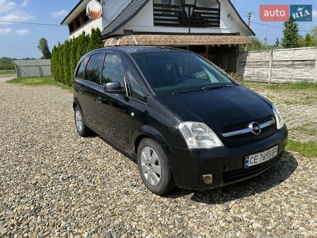 Черный Опель Мерива, объемом двигателя 1.7 л и пробегом 300 тыс. км за 3200 $, фото 3 на Automoto.ua
