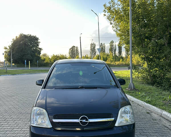 Черный Опель Мерива, объемом двигателя 1.6 л и пробегом 225 тыс. км за 4600 $, фото 5 на Automoto.ua