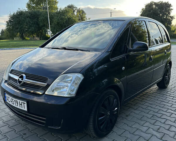 Черный Опель Мерива, объемом двигателя 1.6 л и пробегом 225 тыс. км за 4600 $, фото 2 на Automoto.ua