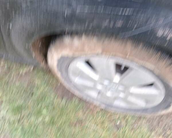 Черный Опель Мерива, объемом двигателя 1.69 л и пробегом 240 тыс. км за 2800 $, фото 3 на Automoto.ua